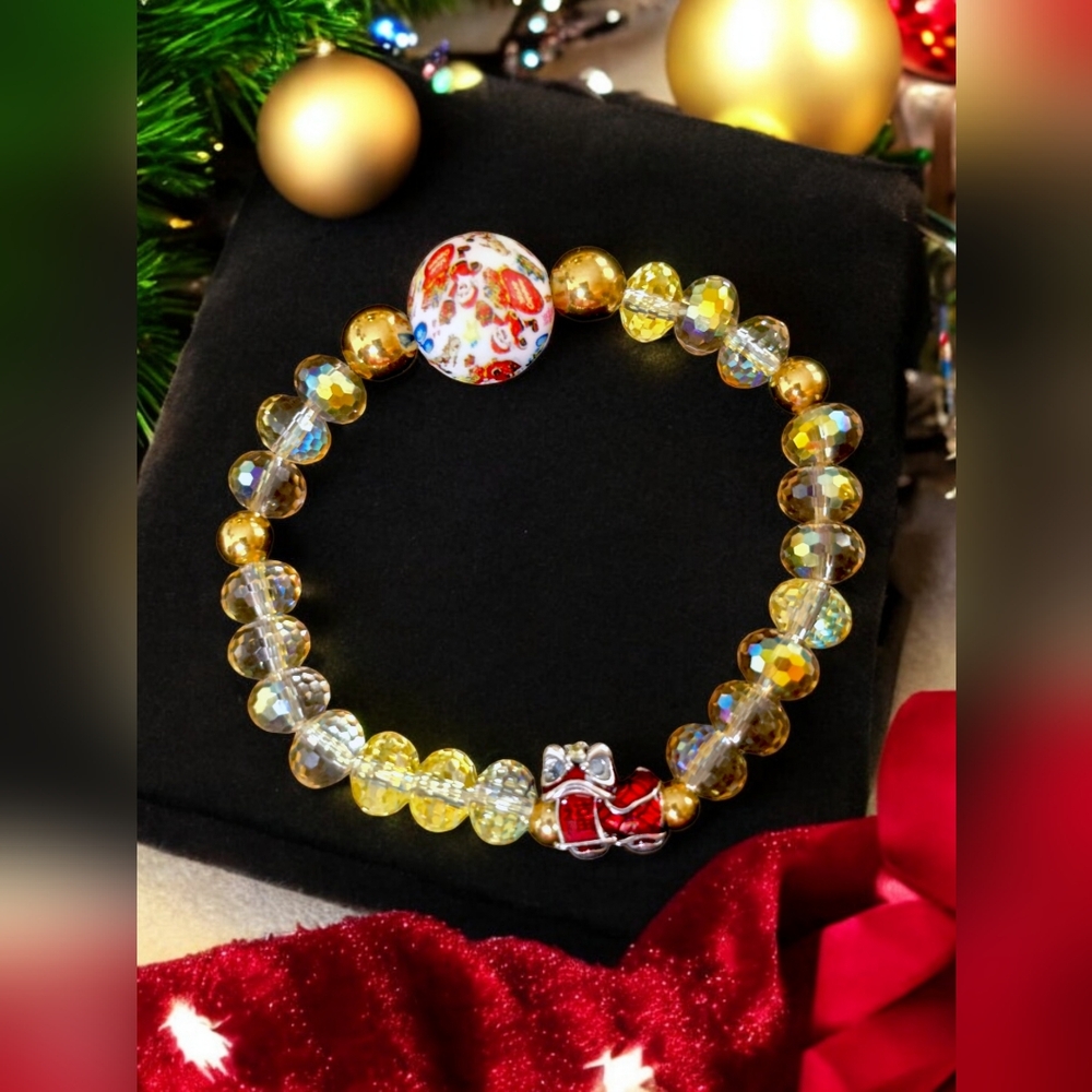 Set of two Christmas bracelets. Austrian crystals. Silicone main bead and 18k...